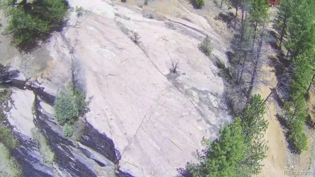 a view of a lake with mountains in the background