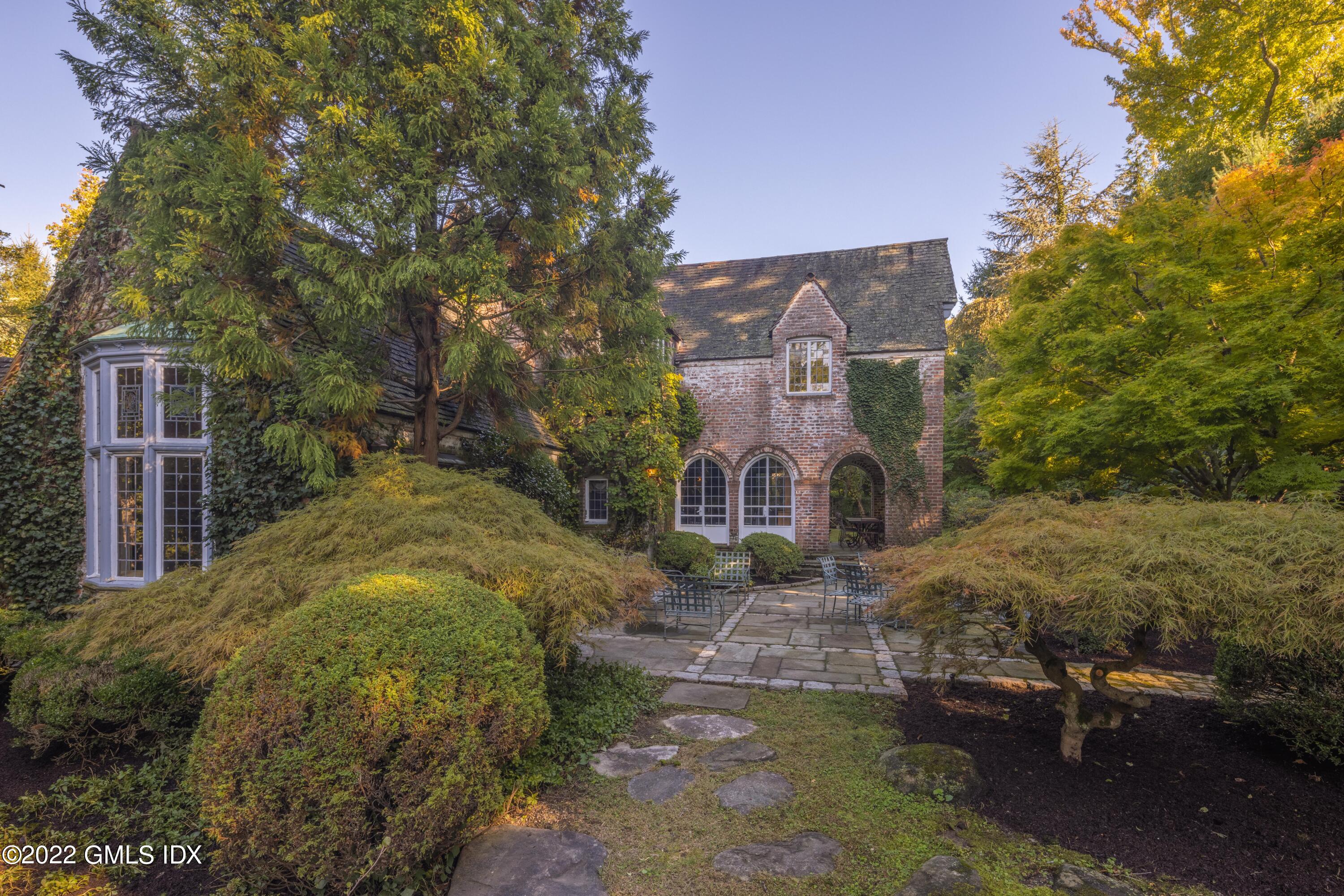 520 Indian Field Road Greenwich, CT 06830 - Photo 15 of 55 a view of a house with a yard