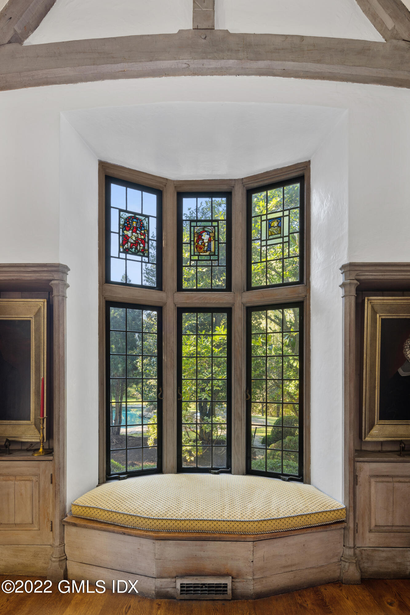 520 Indian Field Road Greenwich, CT 06830 - Photo 22 of 55 a living room with a large window and fireplace