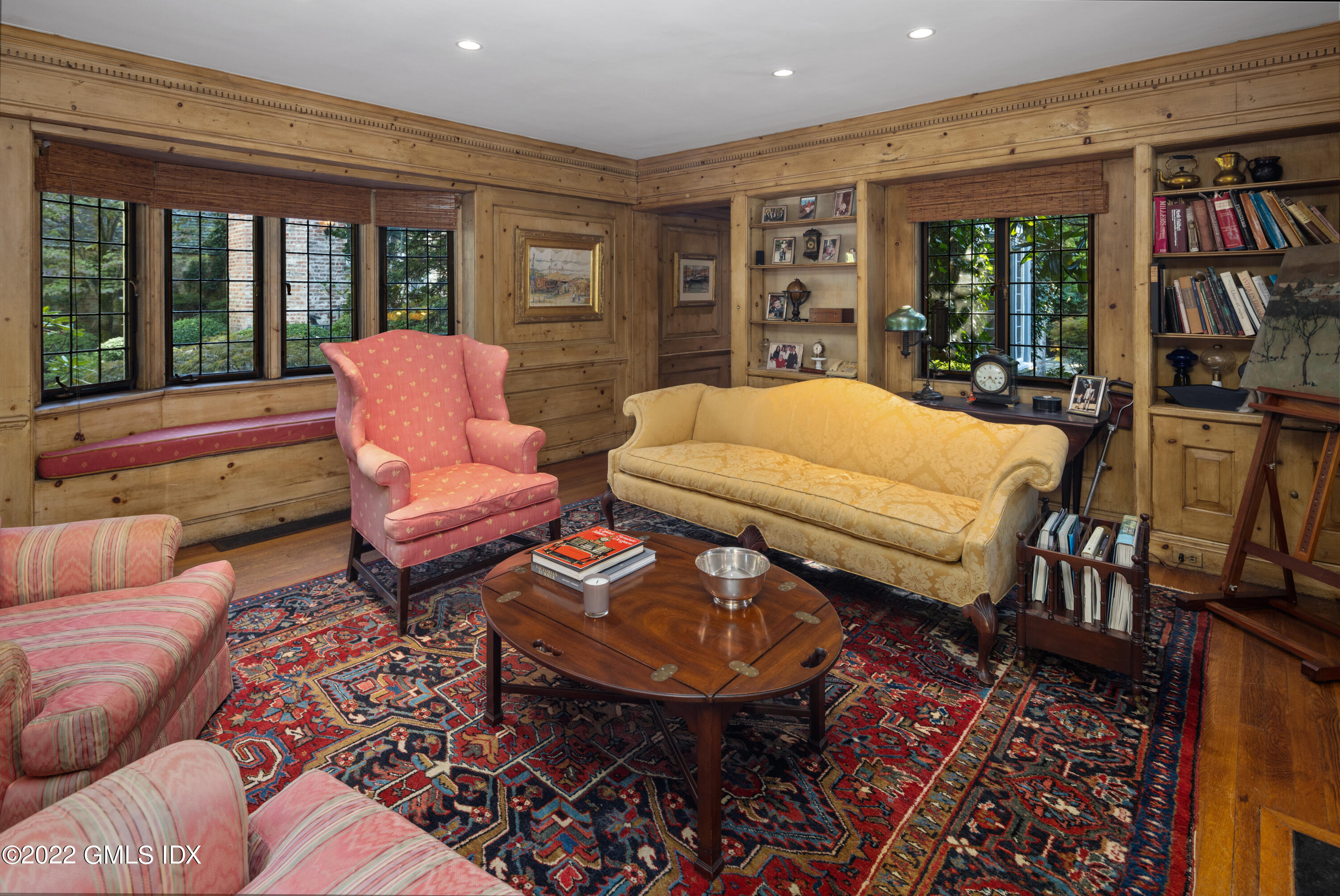 520 Indian Field Road Greenwich, CT 06830 - Photo 28 of 55 a living room with furniture a rug and a large window