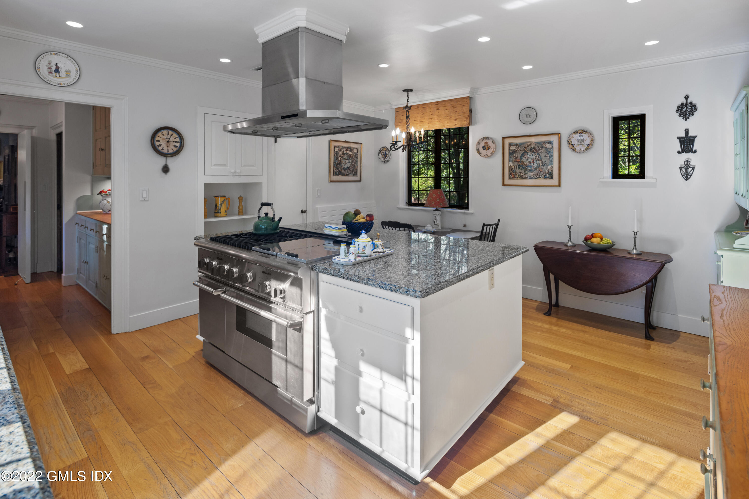 520 Indian Field Road Greenwich, CT 06830 - Photo 33 of 55 a kitchen with stainless steel appliances granite countertop a sink stove and cabinets