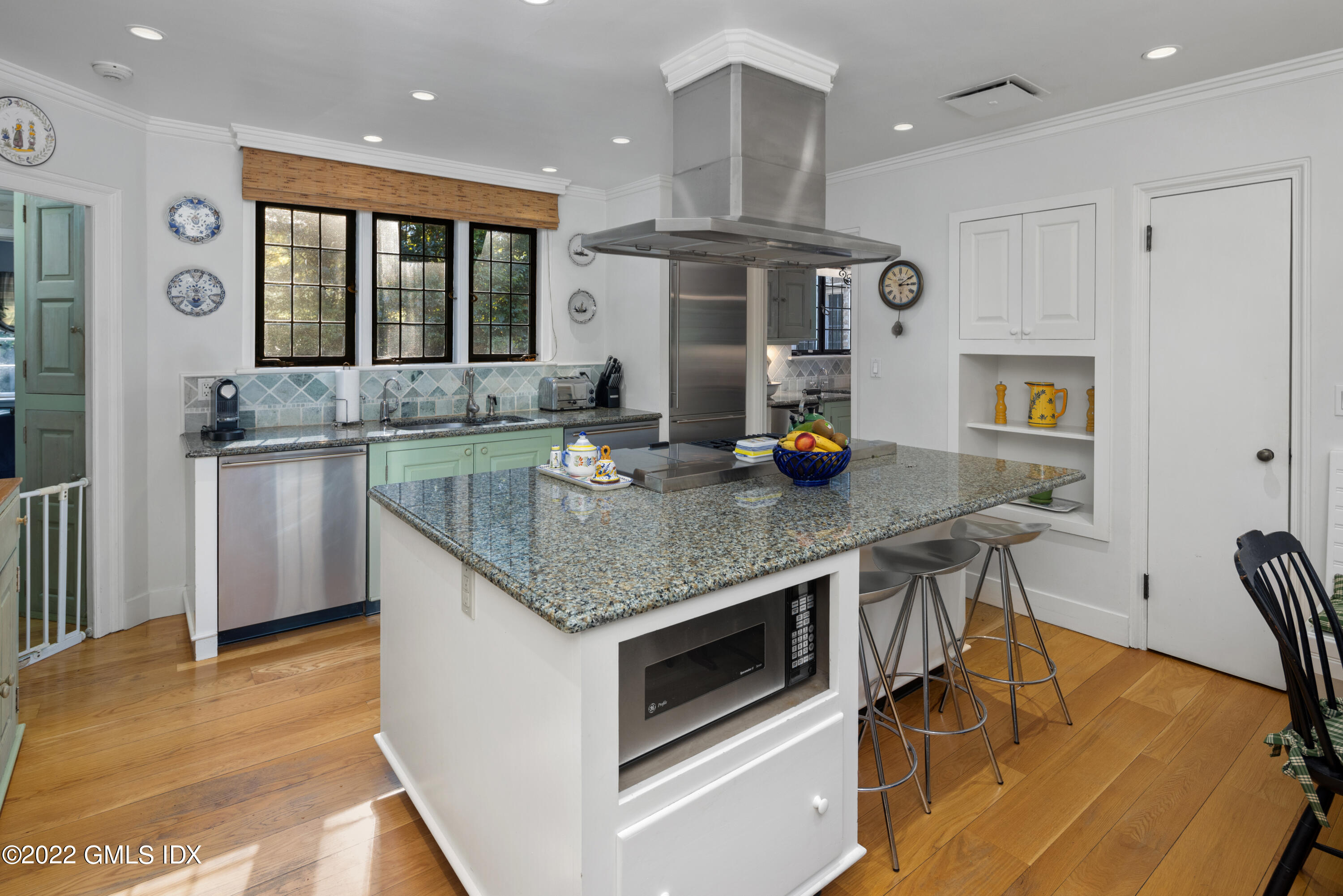 520 Indian Field Road Greenwich, CT 06830 - Photo 36 of 55 a kitchen with stainless steel appliances granite countertop a stove refrigerator and cabinets