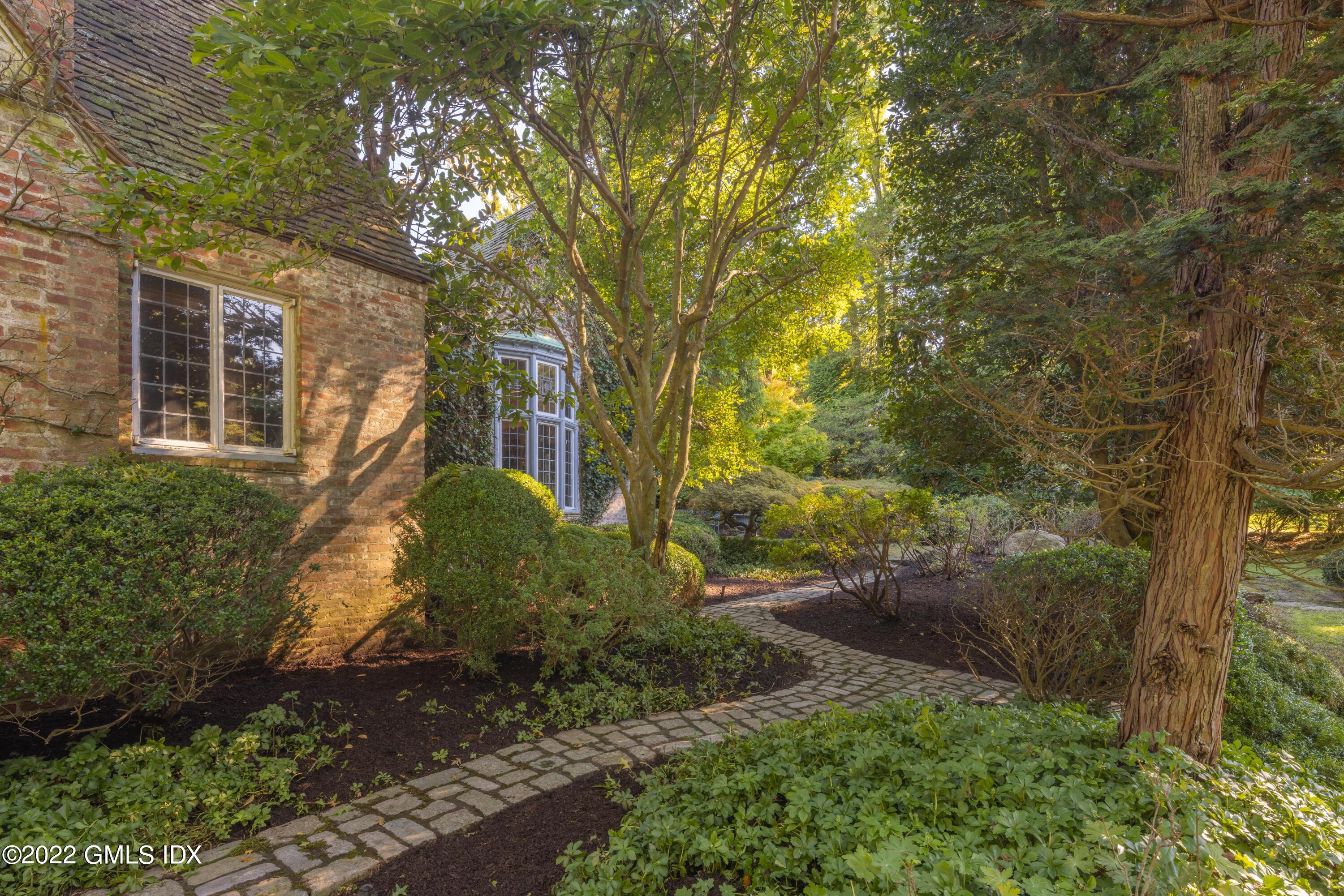 520 Indian Field Road Greenwich, CT 06830 - Photo 42 of 55 a view of a back yard