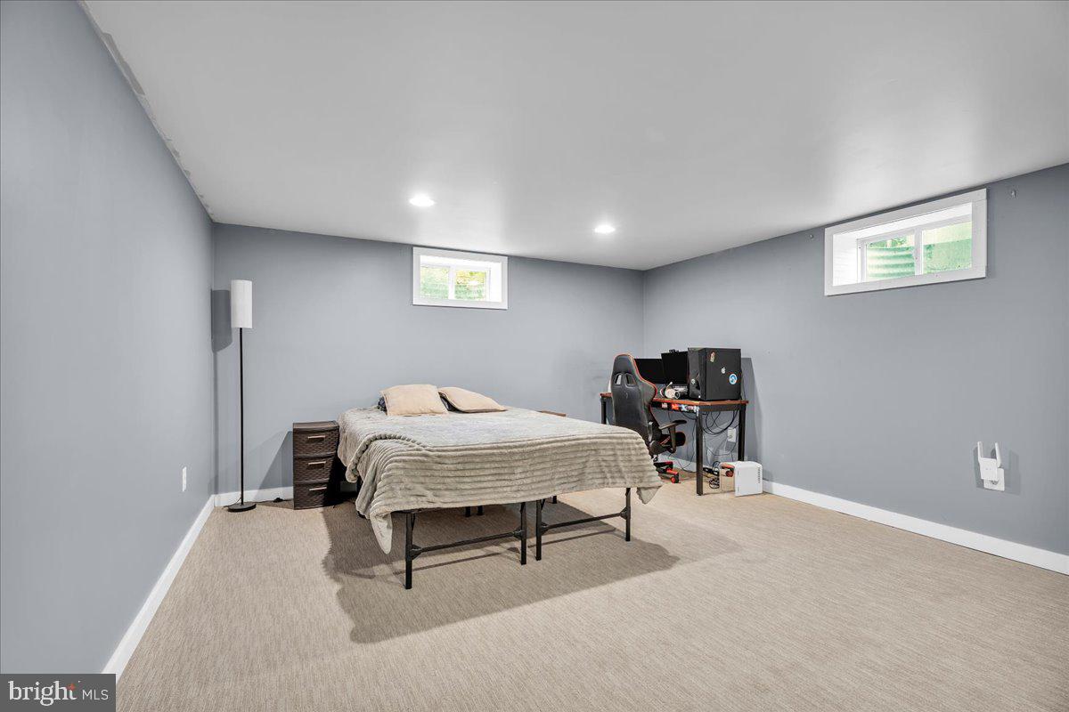 64 Blue Anchor Road Sicklerville, NJ 08081 - Photo 24 of 47 a bedroom with furniture and a window