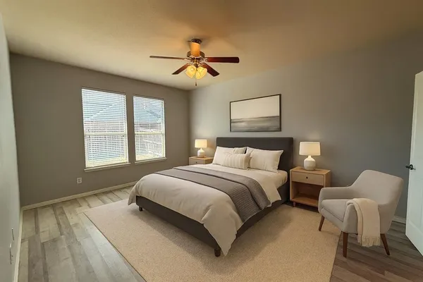 a bedroom with bed and window