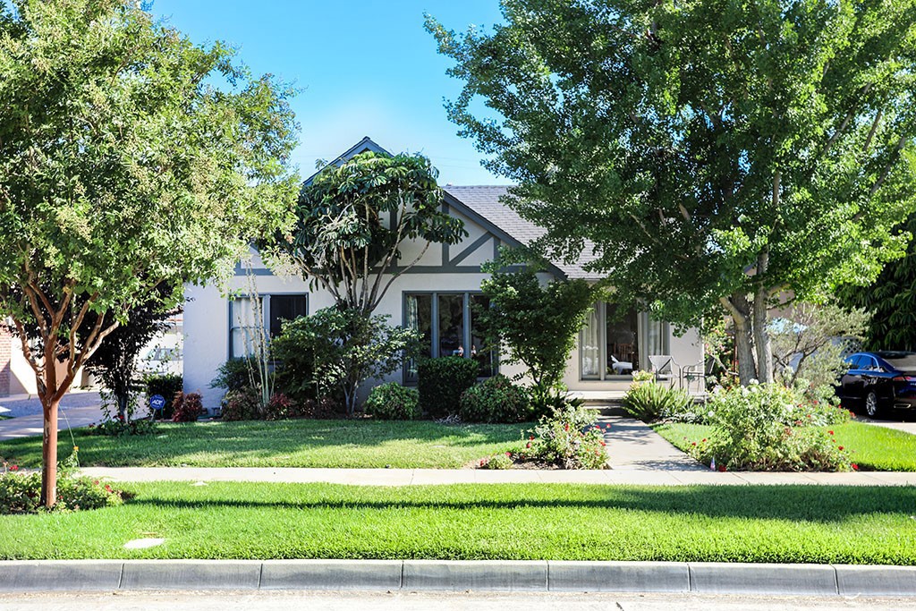 4370 Merrill Avenue Riverside, CA 92506 - Photo 1 of 1 a front view of a house with a yard