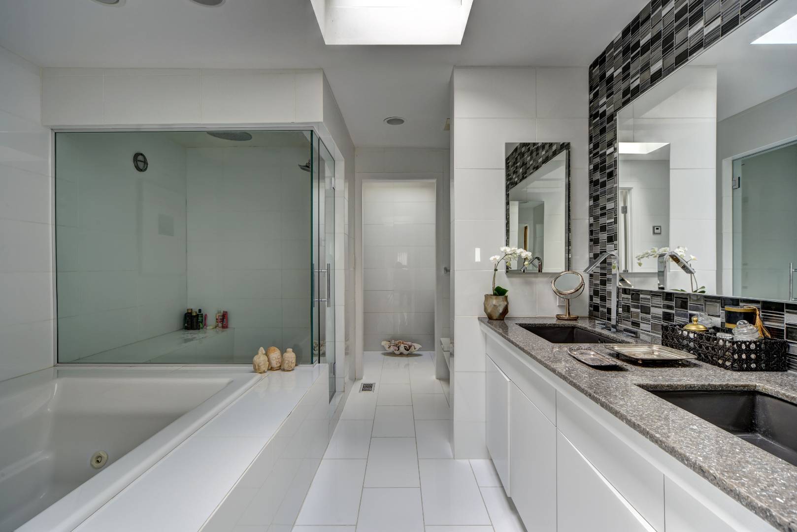 18 Sound View Drive Sag Harbor, NY 11963 - Photo 13 of 28 a bathroom with a bathtub and a sink