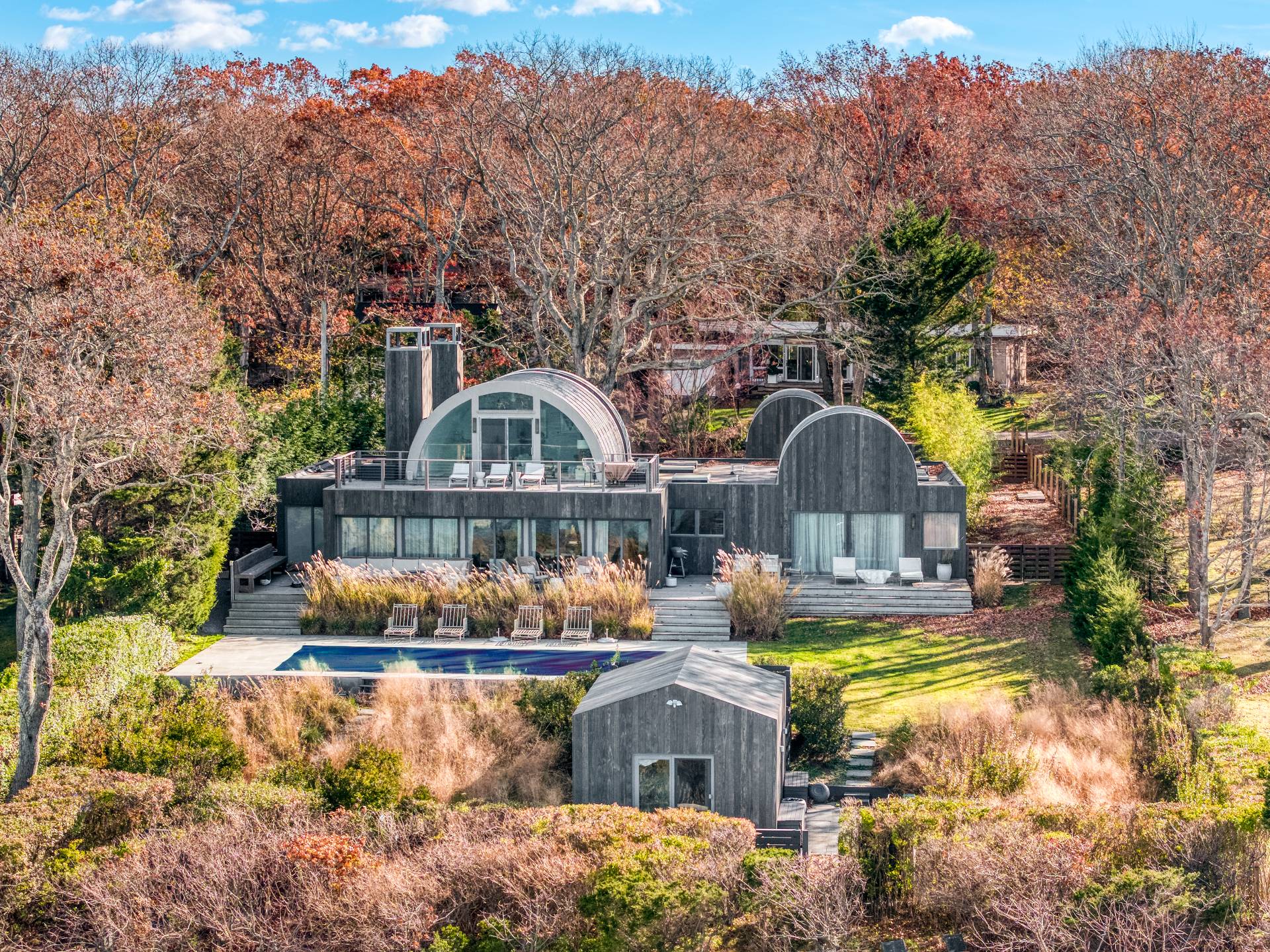18 Sound View Drive Sag Harbor, NY 11963 - Photo 24 of 28 a front view of house with outdoor space and swimming pool