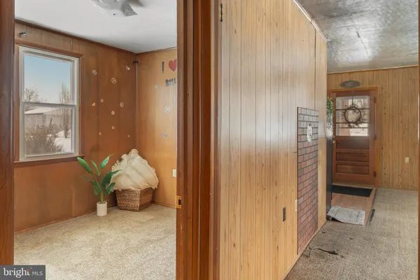 a view of a hallway with closet