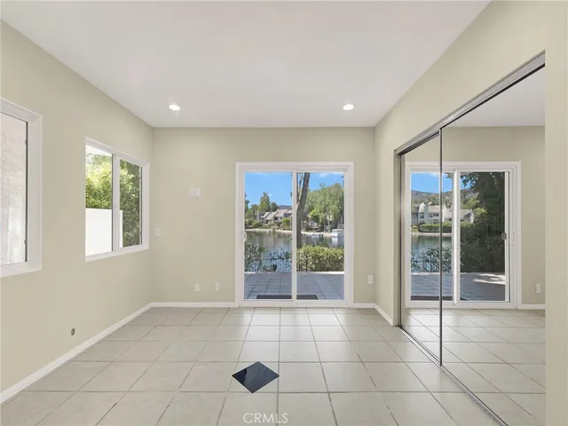 a bathroom with a double vanity sink mirror and double