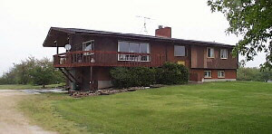 11311 Smith Road Pecatonica, IL 61063 - Photo 1 of 5 a front view of a house with a garden