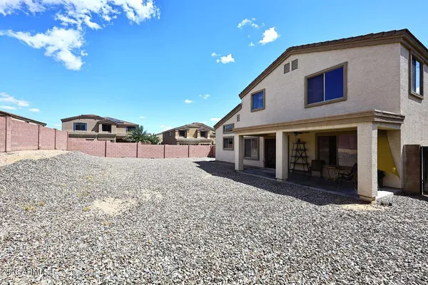 a house view with a backyard