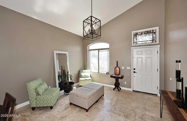 a living room with furniture a couch and dresser