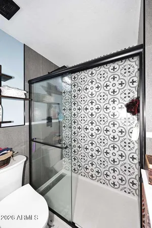 a kitchen with a sink a counter space and appliances