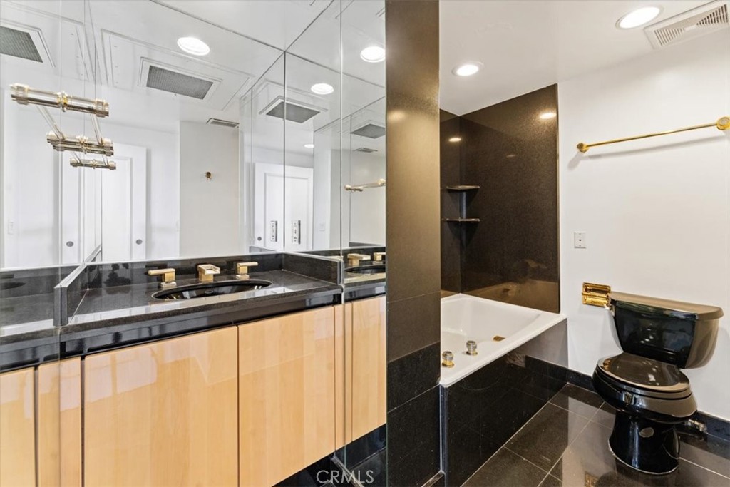 10501 Wilshire Boulevard, Unit 1103 Los Angeles, CA 90024 - Photo 19 of 34 a kitchen with a sink and refrigerator