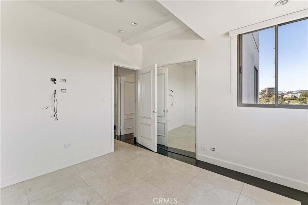 10501 Wilshire Boulevard, Unit 1103 Los Angeles, CA 90024 - Photo 22 of 34 a view of empty room