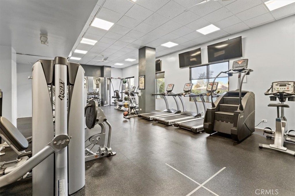 10501 Wilshire Boulevard, Unit 1103 Los Angeles, CA 90024 - Photo 30 of 34 a view of a room with gym equipment