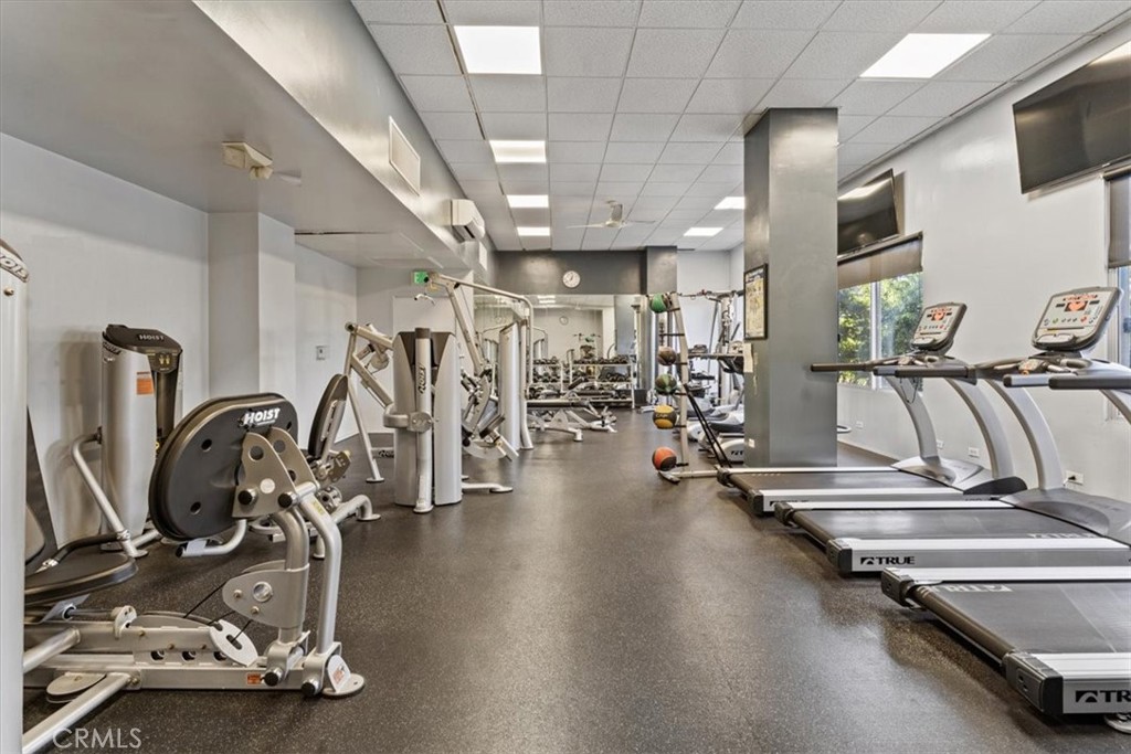 10501 Wilshire Boulevard, Unit 1103 Los Angeles, CA 90024 - Photo 31 of 34 a view of a room with gym equipment
