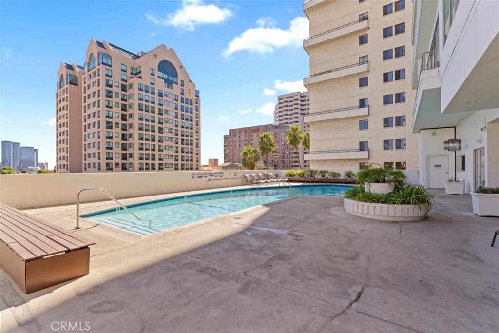 10501 Wilshire Boulevard, Unit 1103 Los Angeles, CA 90024 - Photo 32 of 34 a view of a city with tall buildings