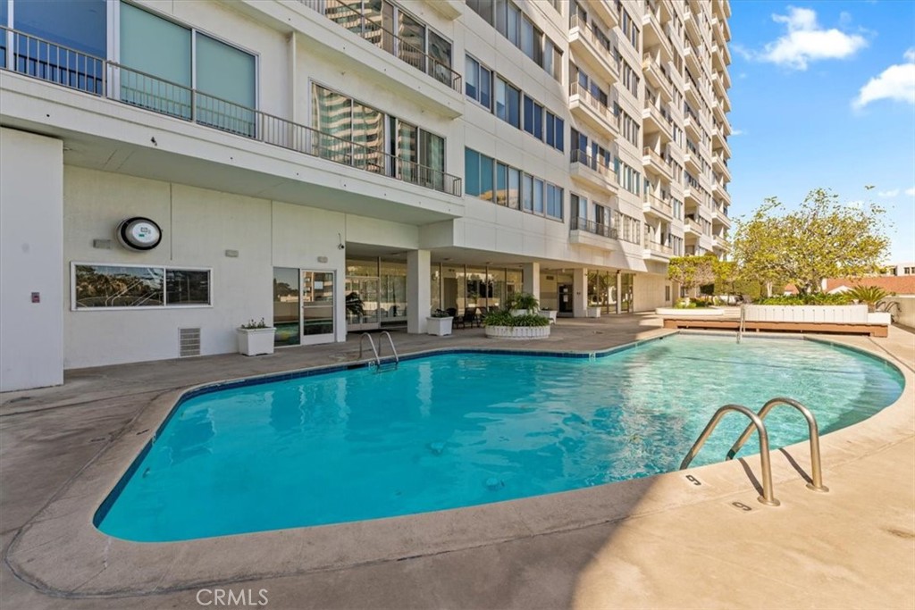 10501 Wilshire Boulevard, Unit 1103 Los Angeles, CA 90024 - Photo 34 of 34 a view of a swimming pool with a patio