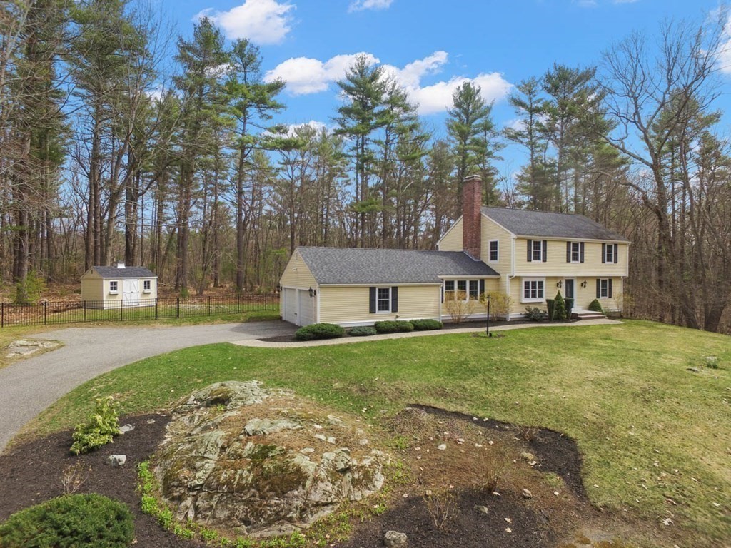 2 Tanglewood Road Boxford, MA 01921 - Photo 34 of 35 a view of a big house with a big yard and large trees