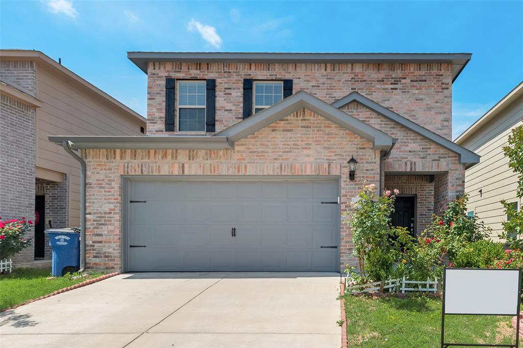 4517 Raleigh Dalton Road Dallas, TX 75227 - Photo 3 of 20 a front view of a house with a garage