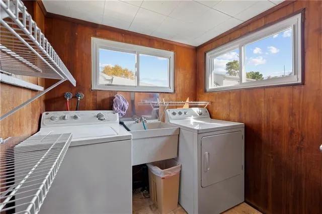 a utility room with dryer and washer