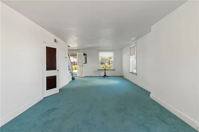a view of a livingroom with furniture