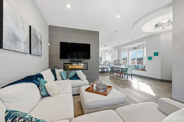 a kitchen that has a sink and a stove in it