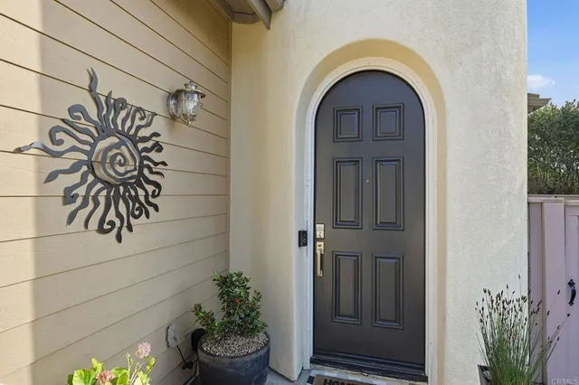 a living room with furniture tv and a flat screen tv