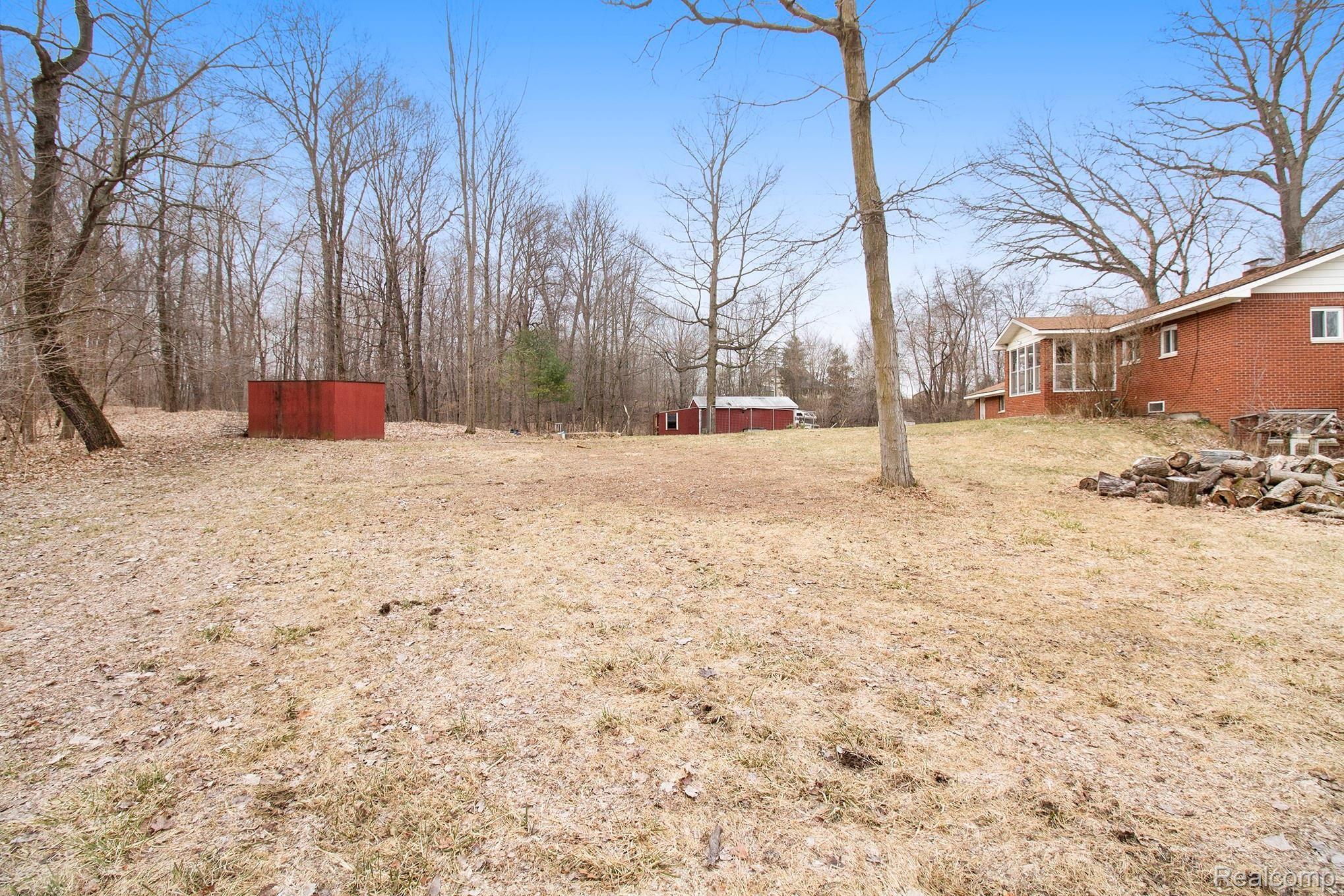 8475 Mason Road Fowlerville, MI 48836 - Photo 8 of 63 backyard