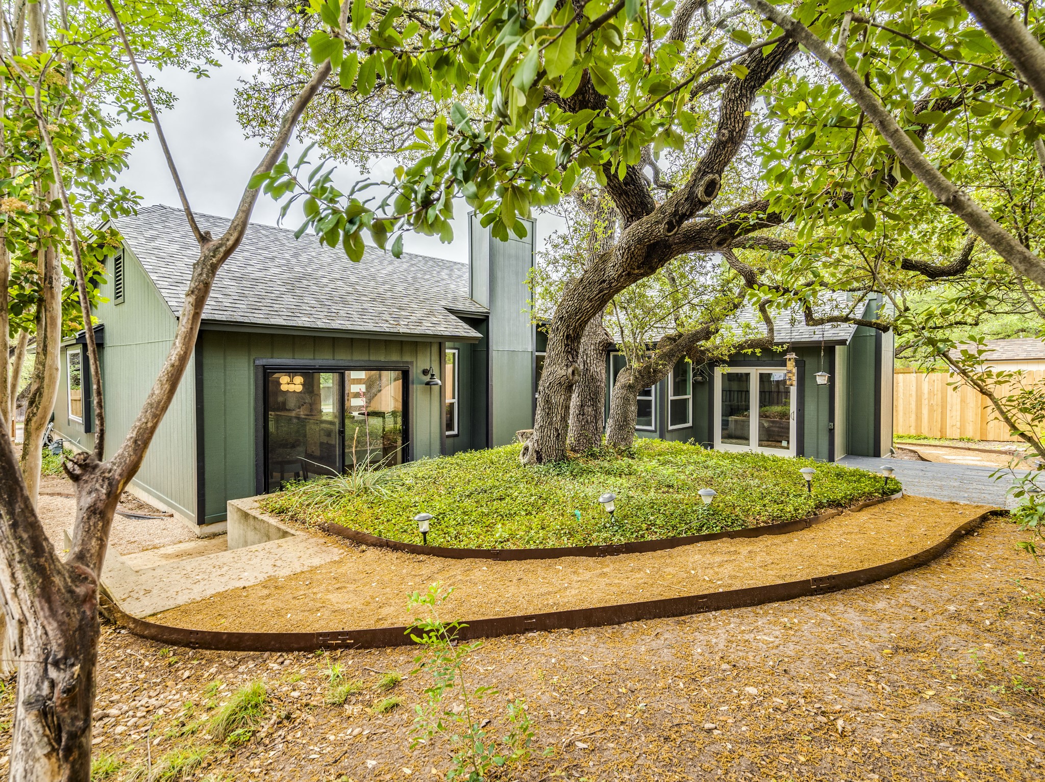11810 Bittern Hollow Austin, TX 78758 - Photo 13 of 22 a front view of a house with a garden