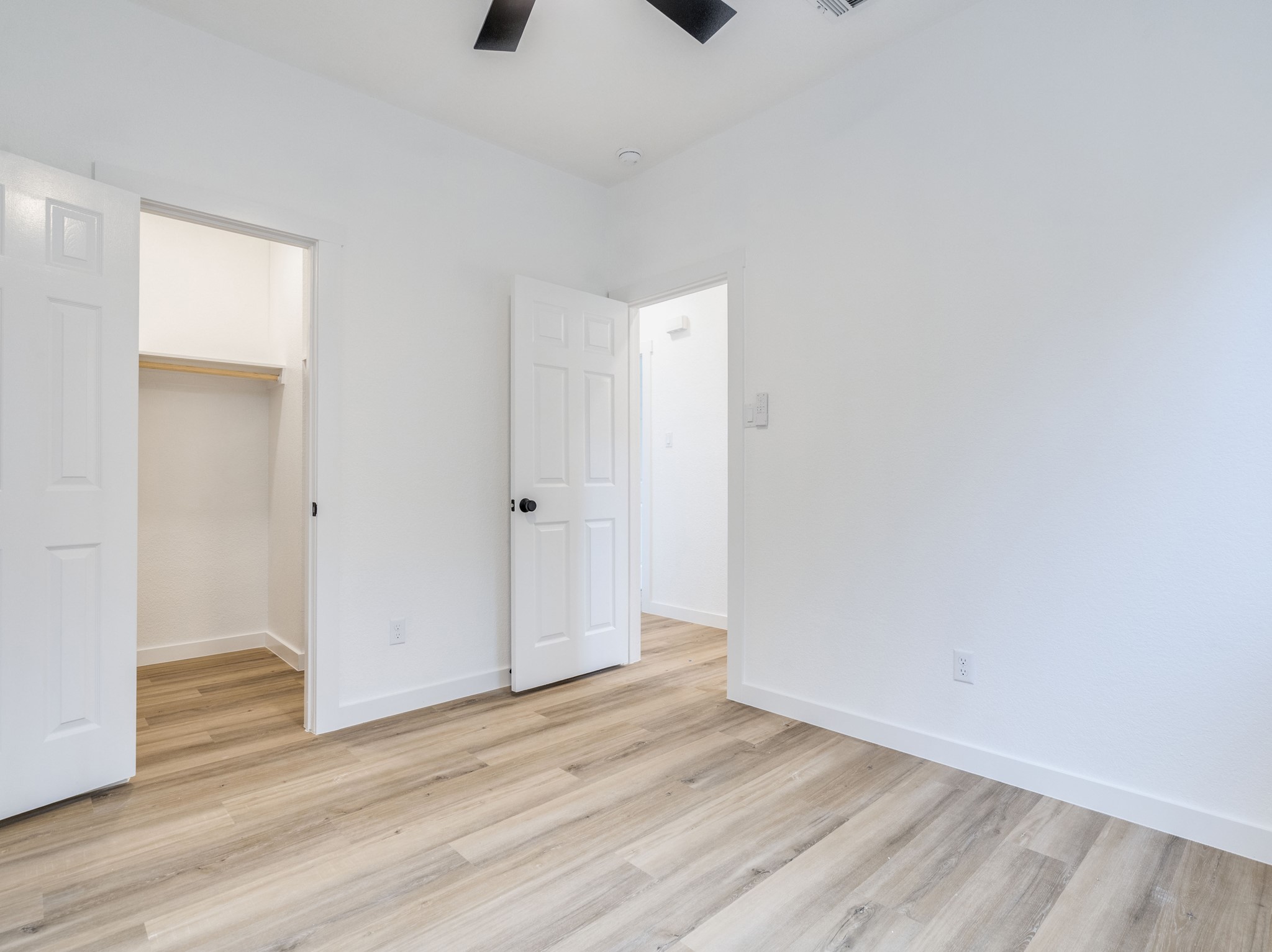 11810 Bittern Hollow Austin, TX 78758 - Photo 14 of 22 a view of an empty room with wooden floor