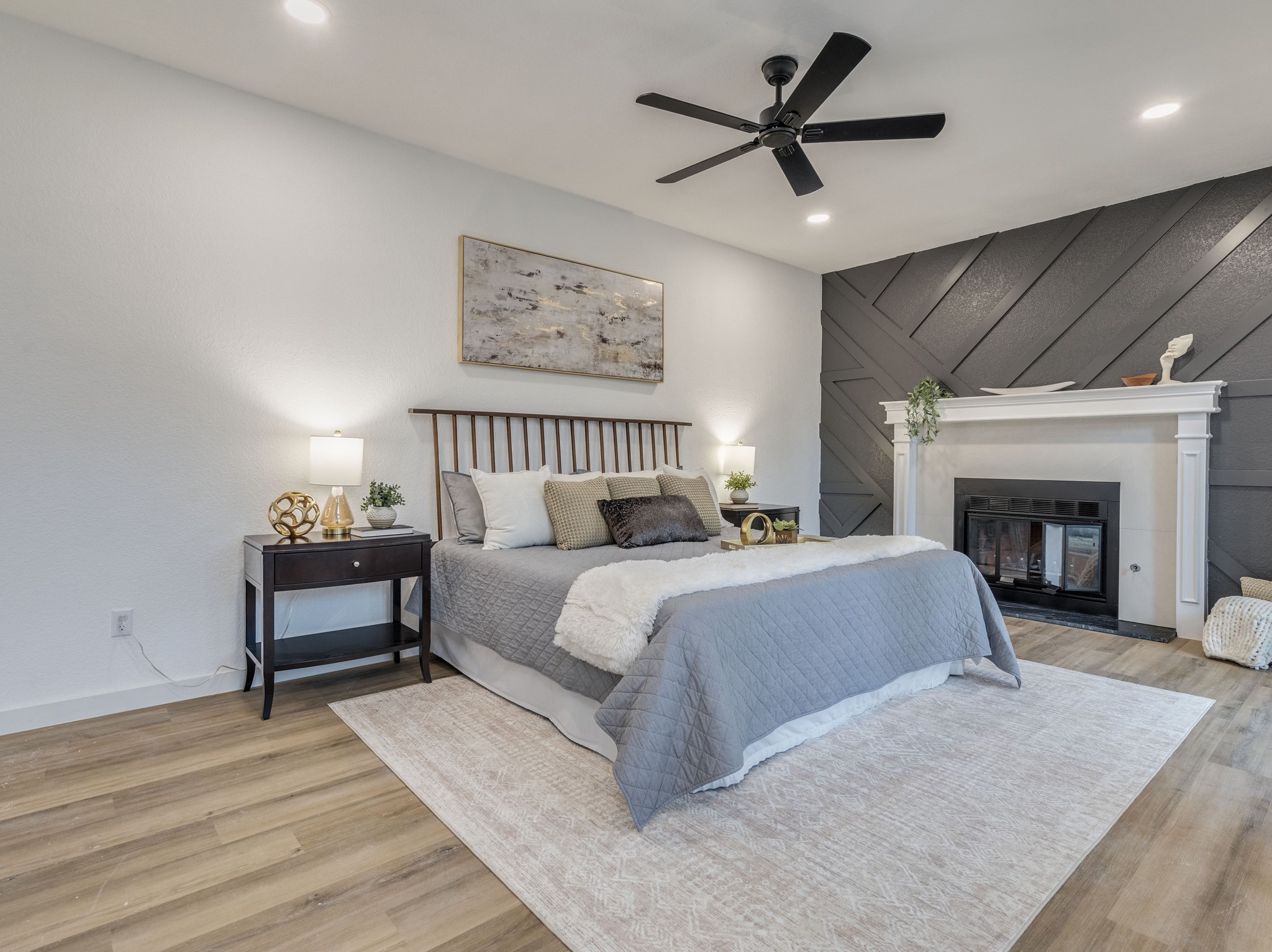 11810 Bittern Hollow Austin, TX 78758 - Photo 20 of 22 a bedroom with a bed and a ceiling fan