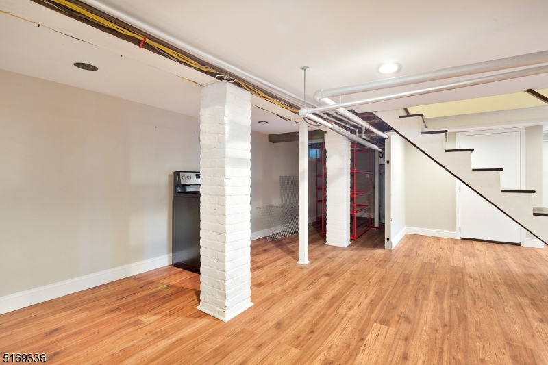 62 Crane Street Caldwell, NJ 07006 - Photo 24 of 28 a view of empty room with wooden floor