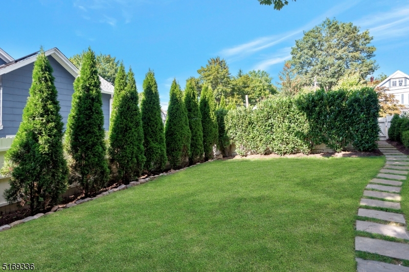 62 Crane Street Caldwell, NJ 07006 - Photo 27 of 28 a view of a yard with an trees