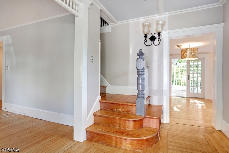 62 Crane Street Caldwell, NJ 07006 - Photo 4 of 28 a view of an entryway with wooden floor