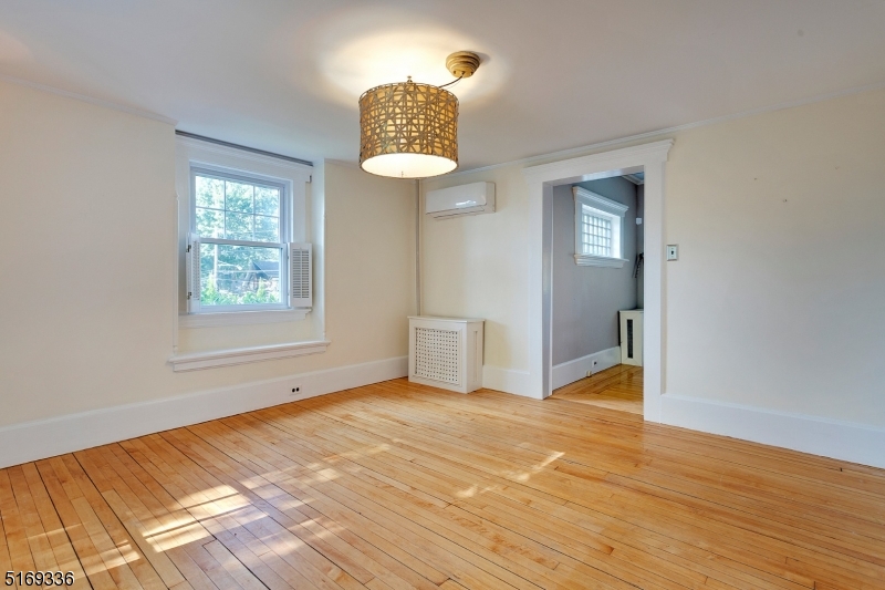 62 Crane Street Caldwell, NJ 07006 - Photo 6 of 28 a view of an empty room and window