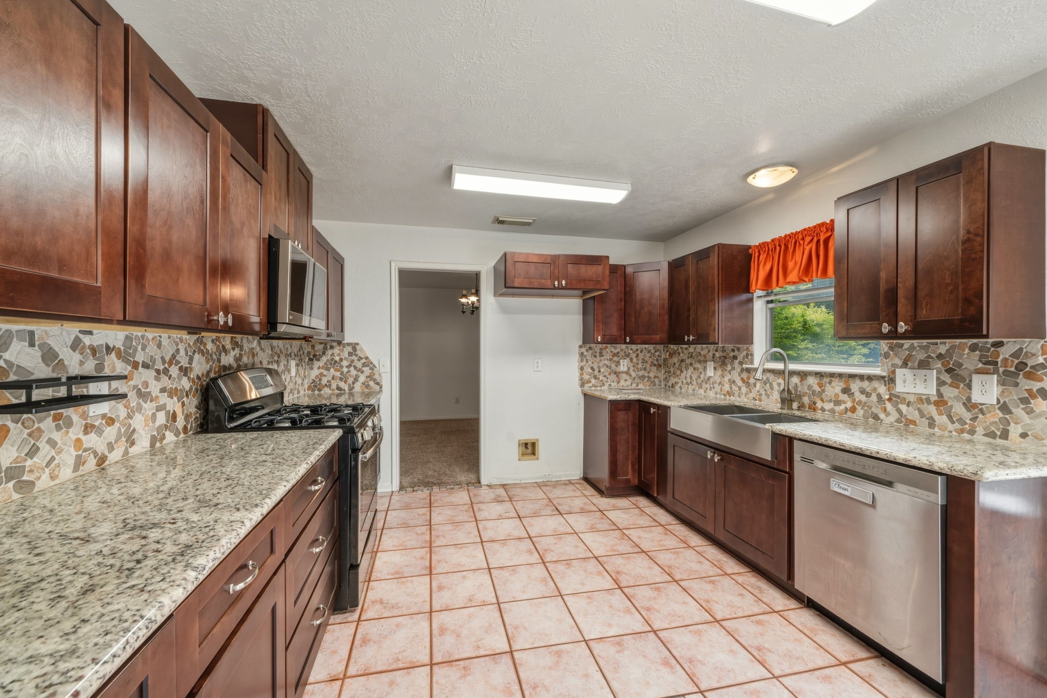 5619 Roserock Lane Spring, TX 77379 - Photo 13 of 45 Equipped with farmhouse style double sink!