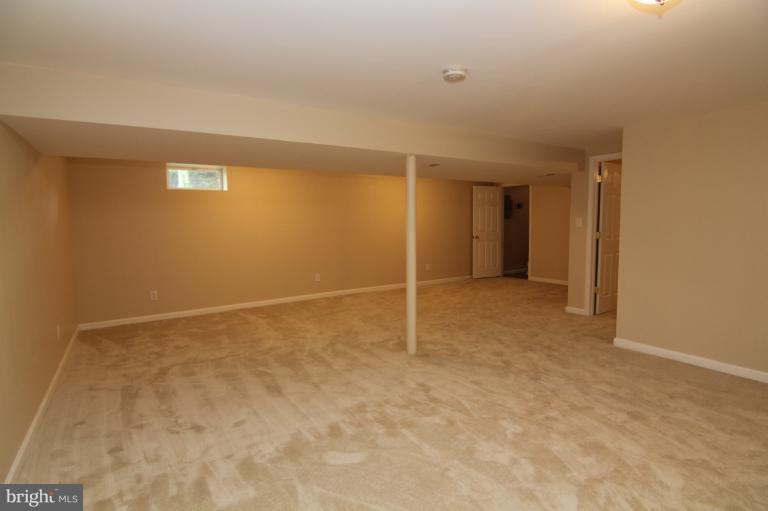 2038 Rolling Rd. Windsor Mill, MD 21244 - Photo 7 of 16 a view of an empty room