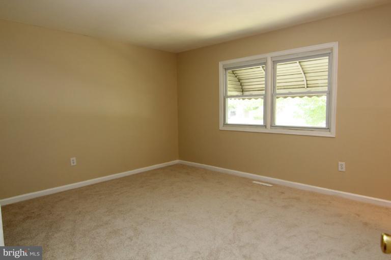2038 Rolling Rd. Windsor Mill, MD 21244 - Photo 9 of 16 an empty room with a window