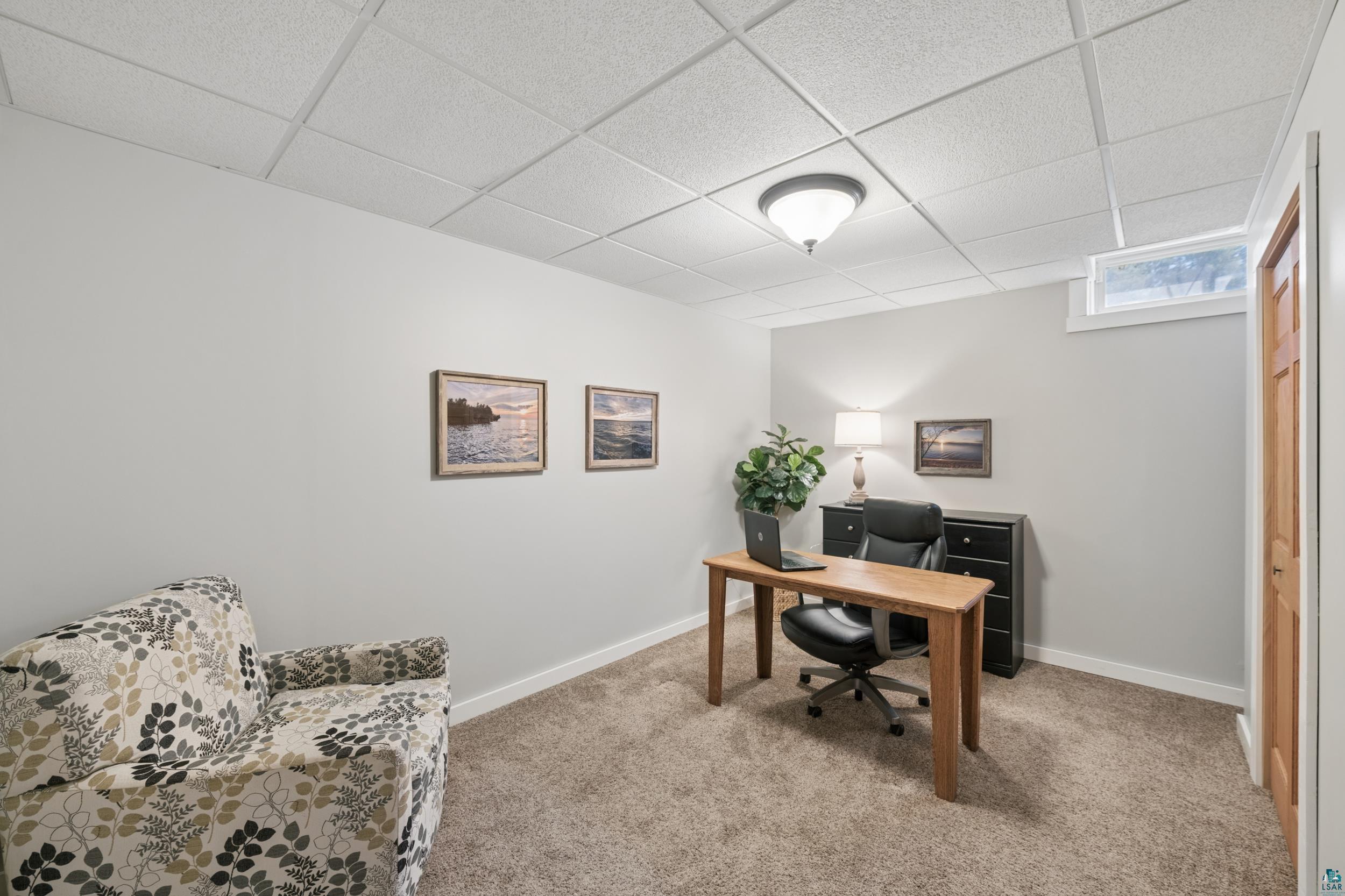 3113 Golf Course Road Ashland, WI 54806 - Photo 28 of 38 Carpeted room featuring a drop ceiling with recessed lighting