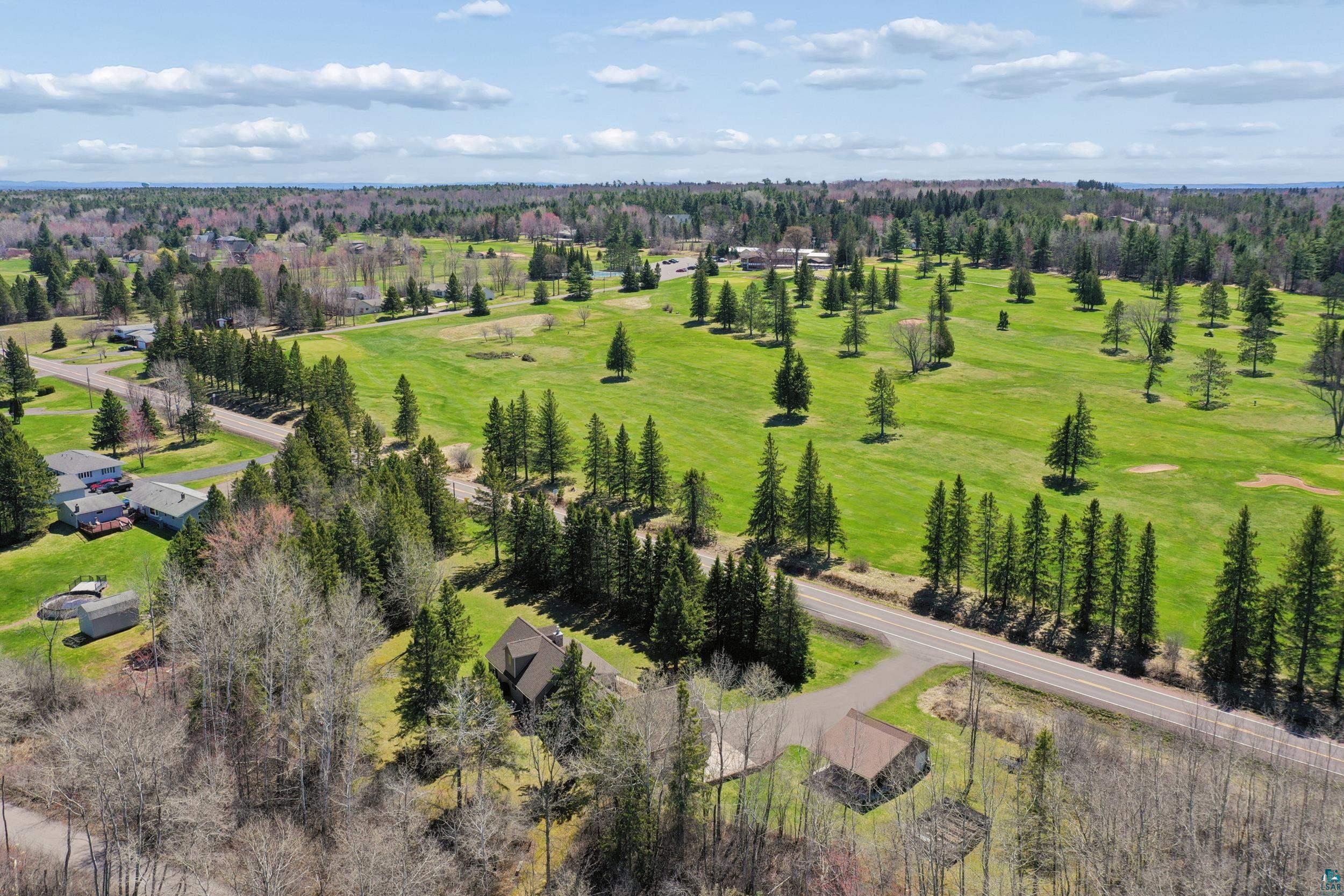 3113 Golf Course Road Ashland, WI 54806 - Photo 5 of 38 Expansive green spaces featuring mature trees and established roads