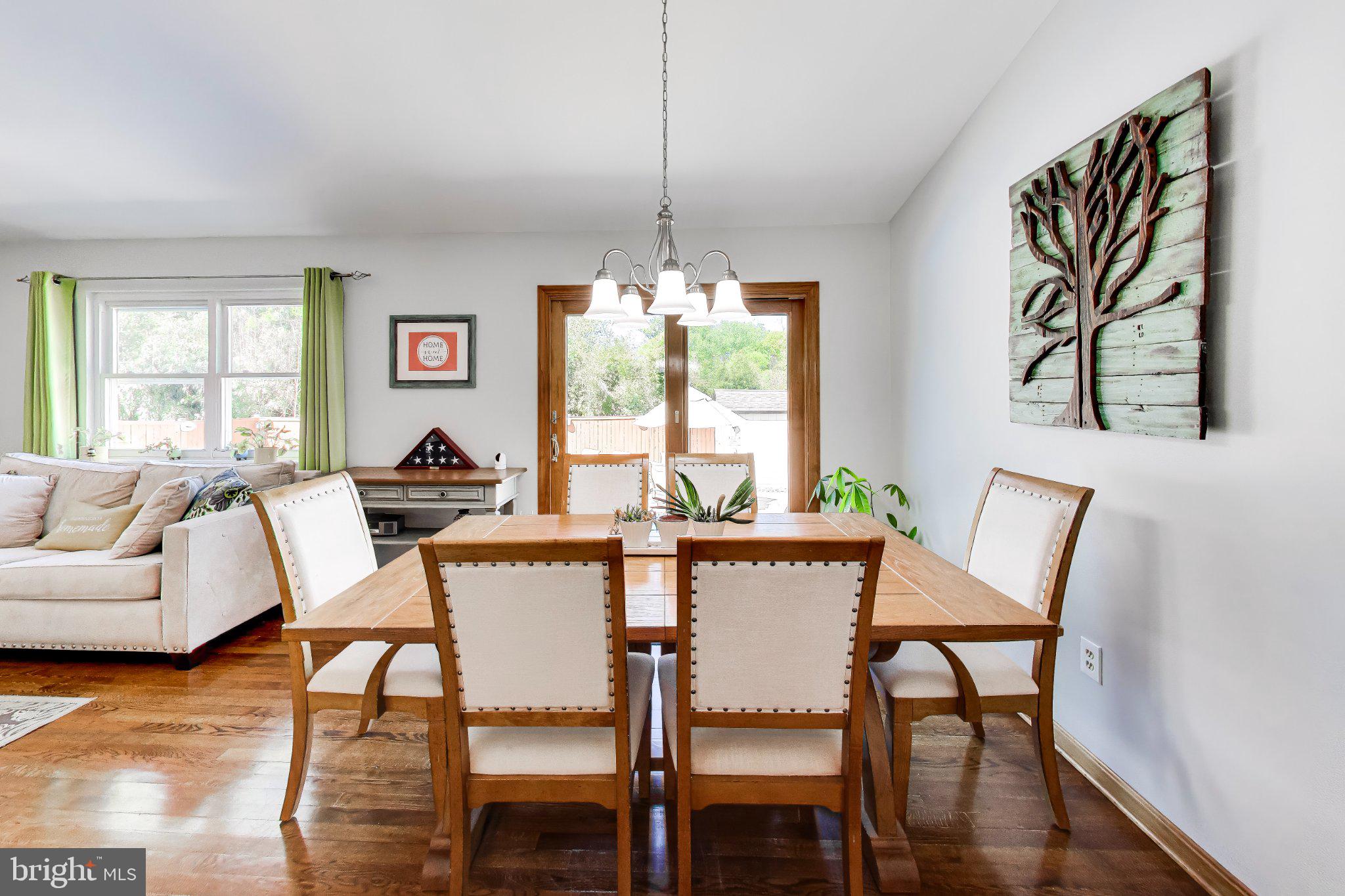 14216 Alderton Road Silver Spring, MD 20906 - Photo 15 of 63 a view of a dining room with furniture window and outside view