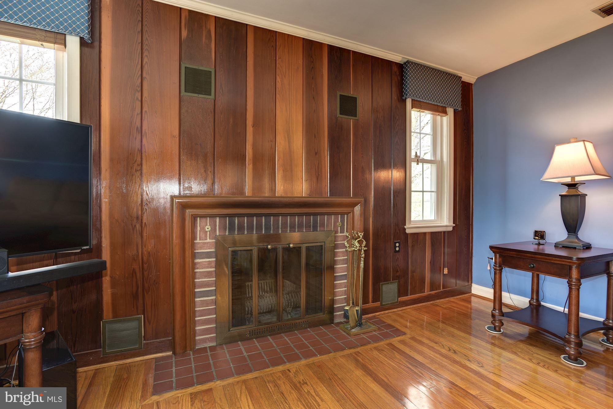 10030 Reed Lane Ellicott City, MD 21042 - Photo 7 of 39 Wood Accent Wall & Wood-Burning Fireplace