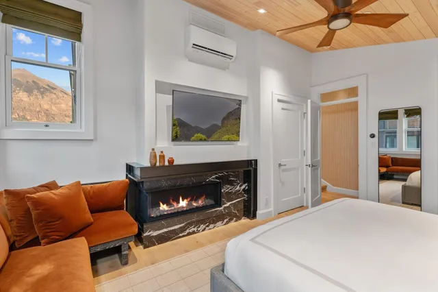 a bathroom with a sink double vanity and a mirror