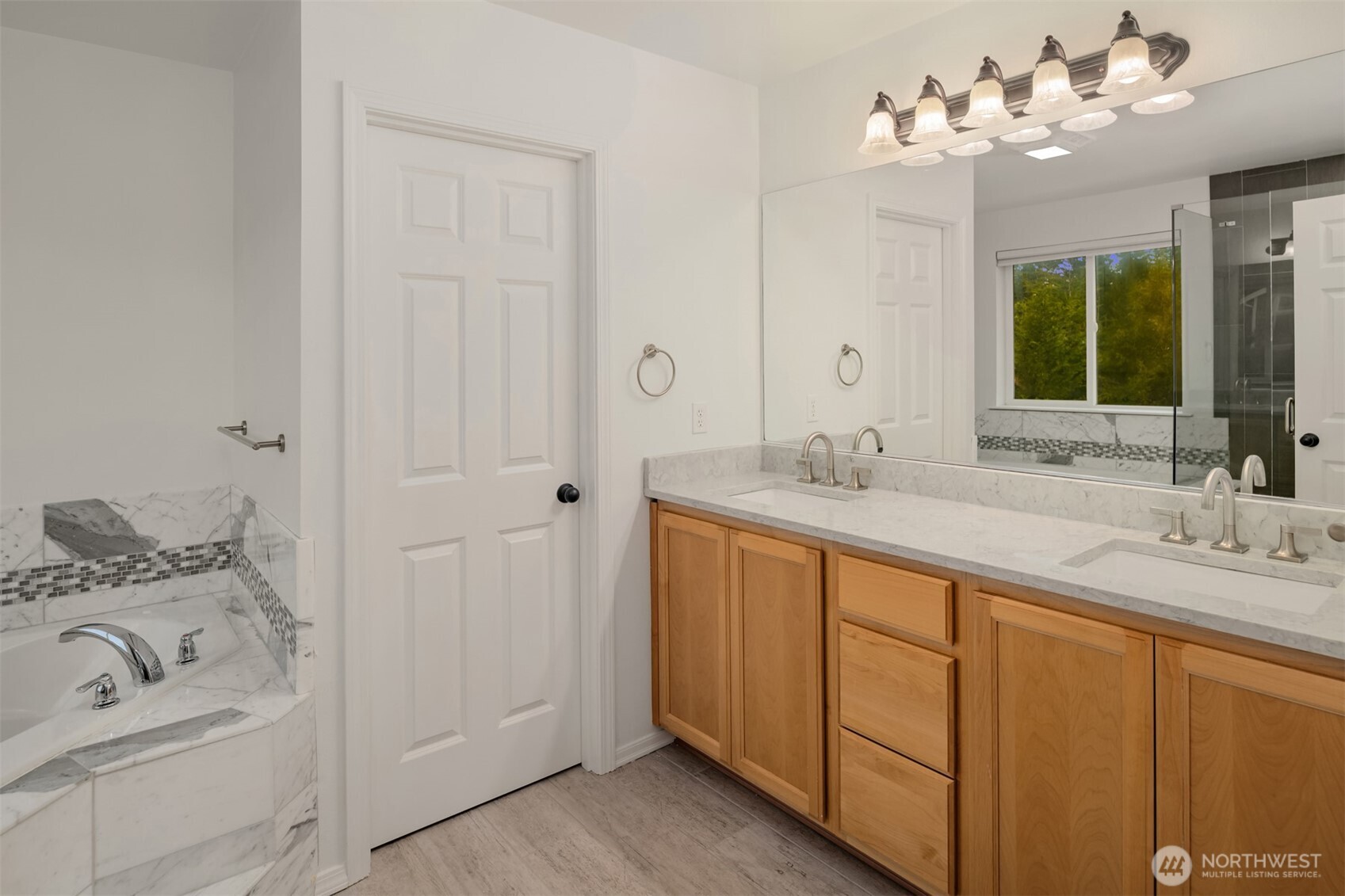 21120 Meridian Place West Bothell, WA 98021 - Photo 19 of 36 a bathroom with a sink double vanity and a mirror