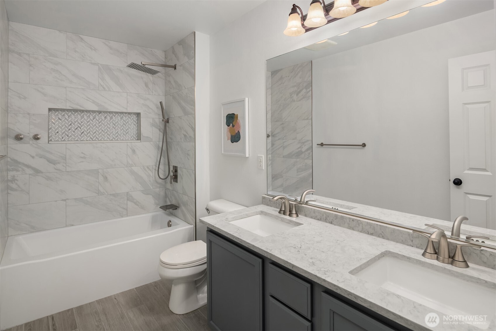21120 Meridian Place West Bothell, WA 98021 - Photo 22 of 36 a bathroom with a granite countertop sink a toilet and shower
