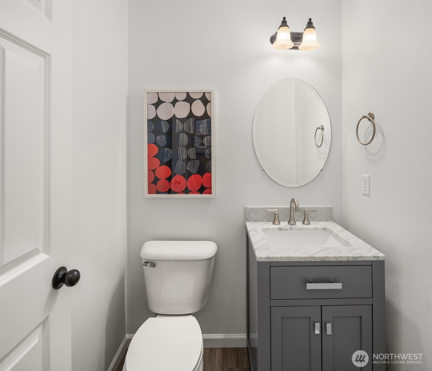 21120 Meridian Place West Bothell, WA 98021 - Photo 26 of 36 a bathroom with a toilet a sink and mirror