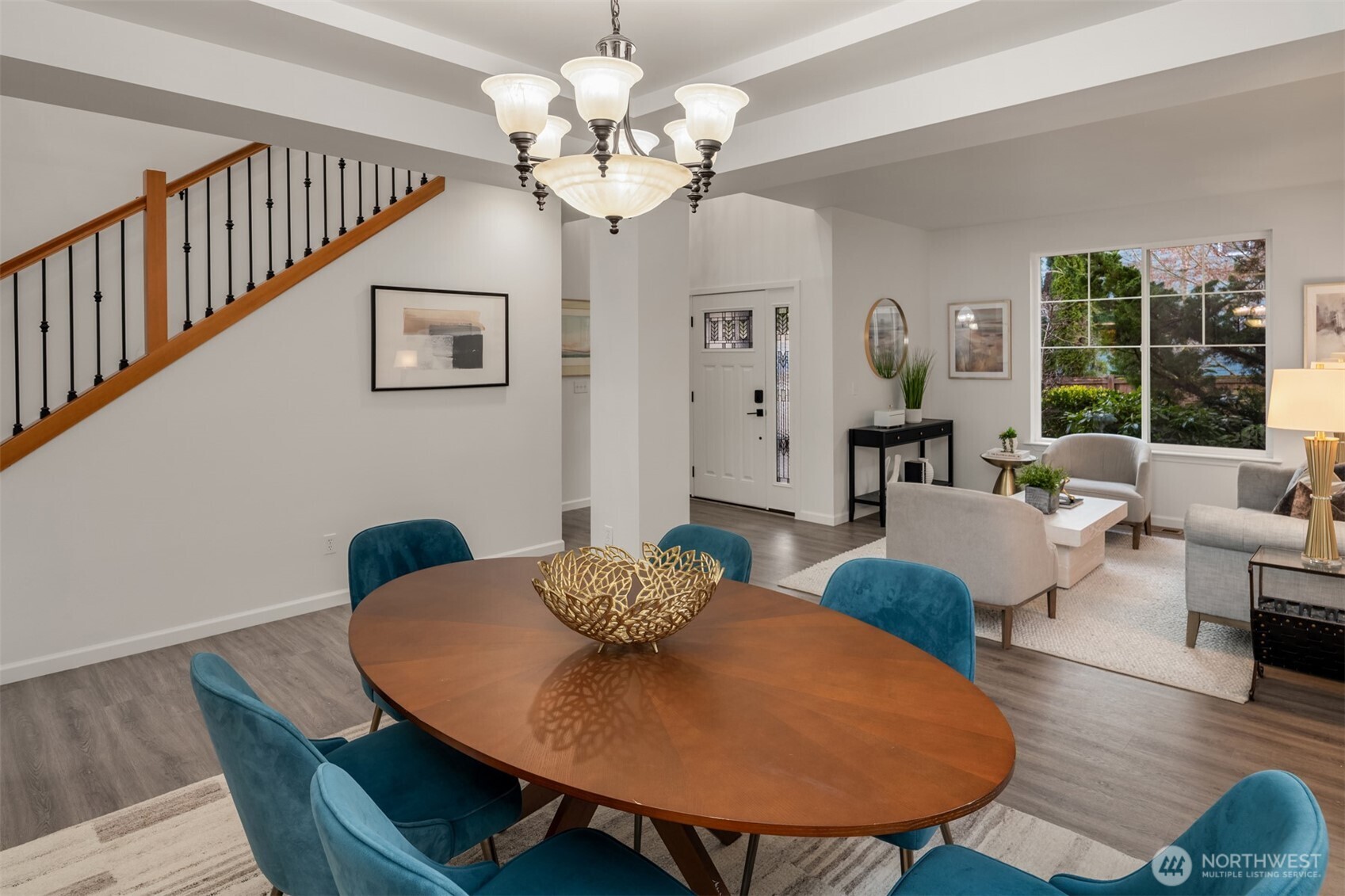 21120 Meridian Place West Bothell, WA 98021 - Photo 6 of 36 a view of a dining room with furniture wooden floor and chandelier